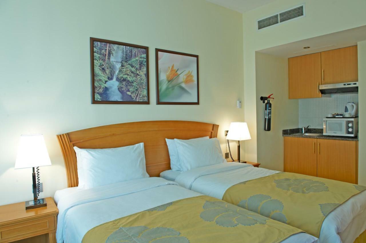 Golden Tulip Sharjah Aparthotel ภายนอก รูปภาพ